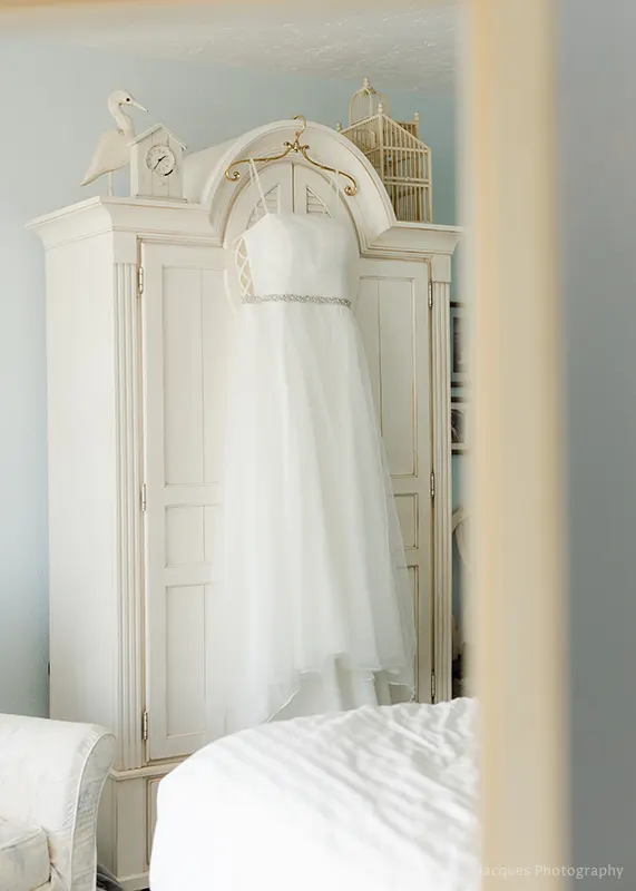 Inn at Spanish Head Wedding Dress in Guest Room